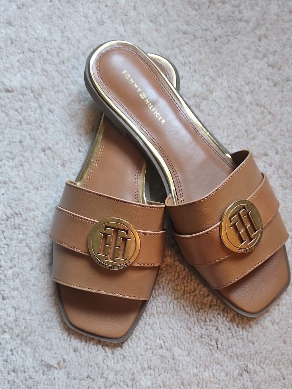 Tommy Hilfiger Tan Slide Mules with Gold Logo Medallion